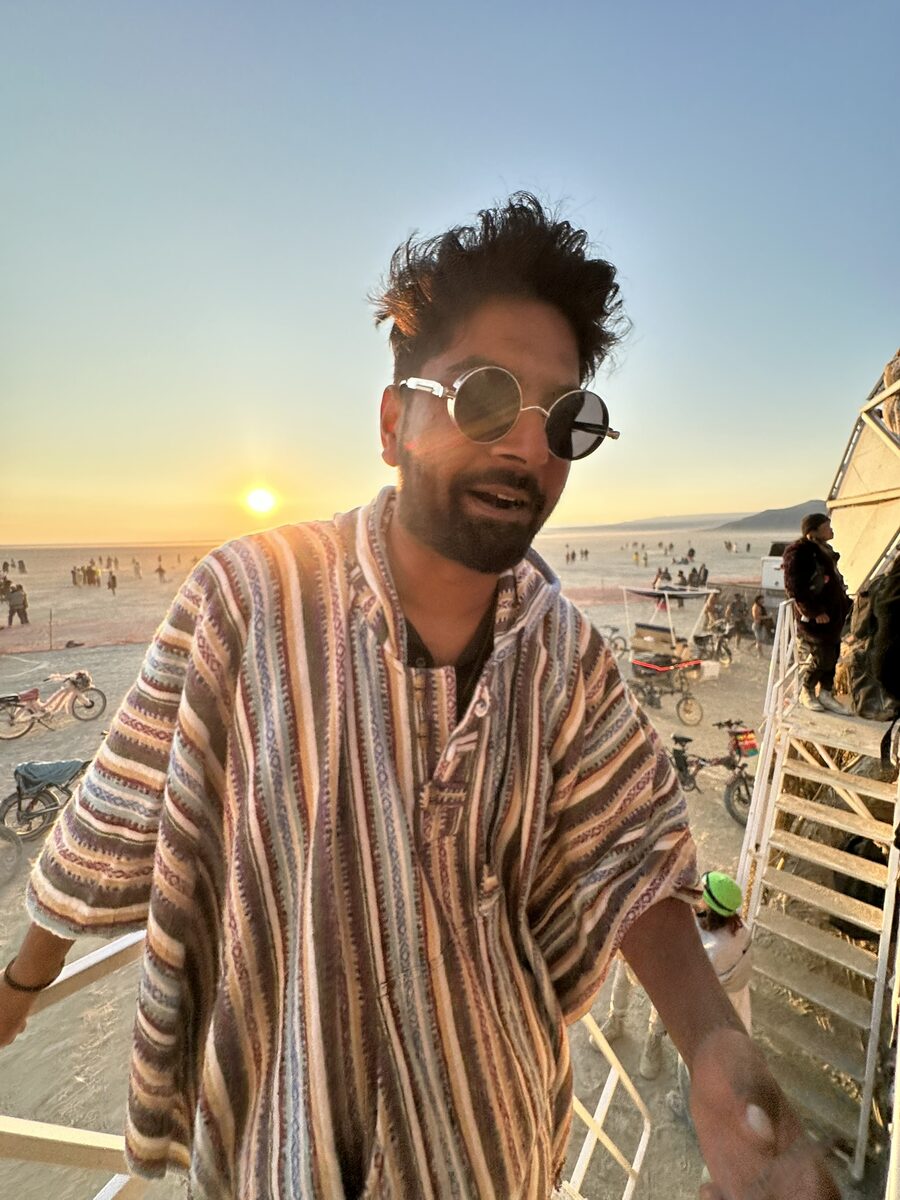 Festival scene, man in striped shirt